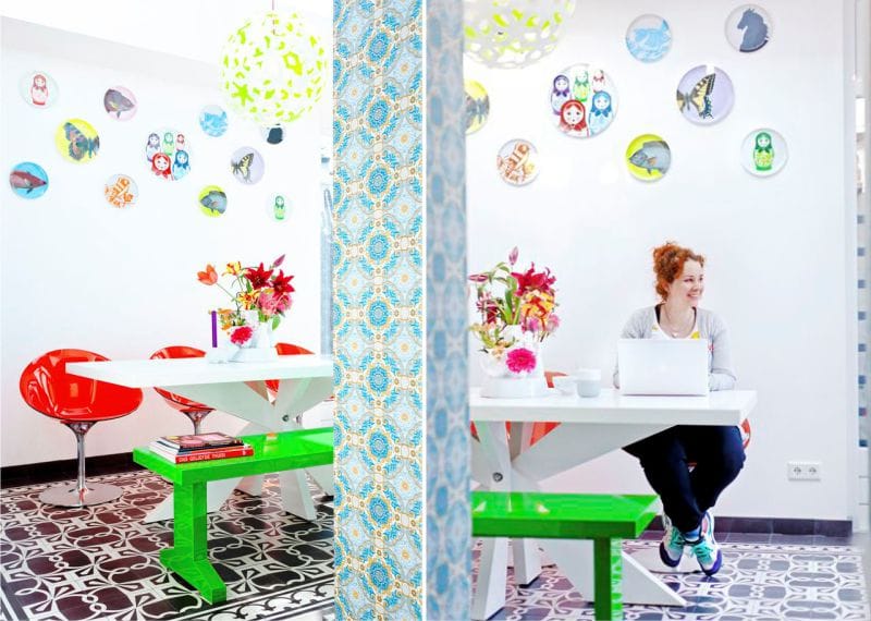 Bright plates on the wall in the interior of a modern kitchen