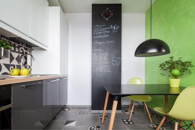Green accent wall in the kitchen