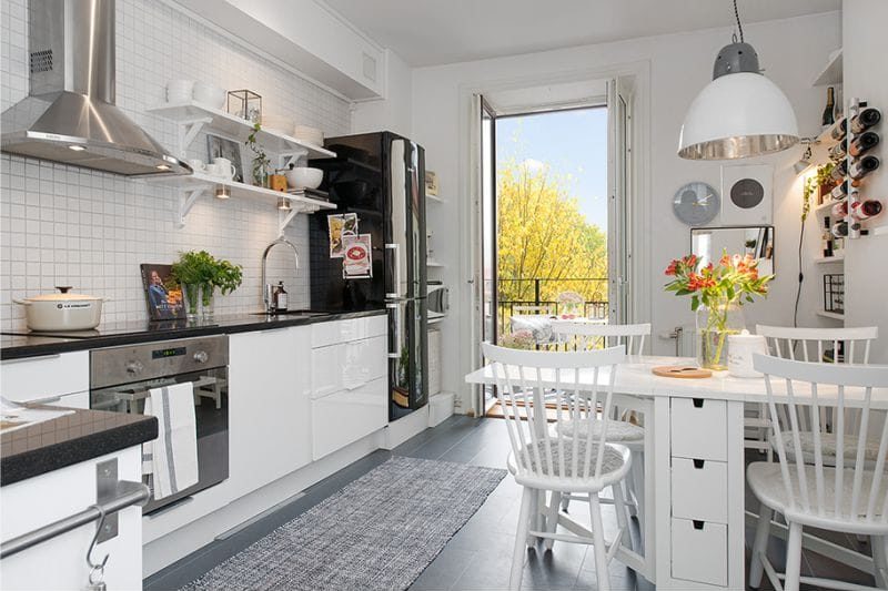 Corner kitchen of 14 square meters. meters in Scandinavian style