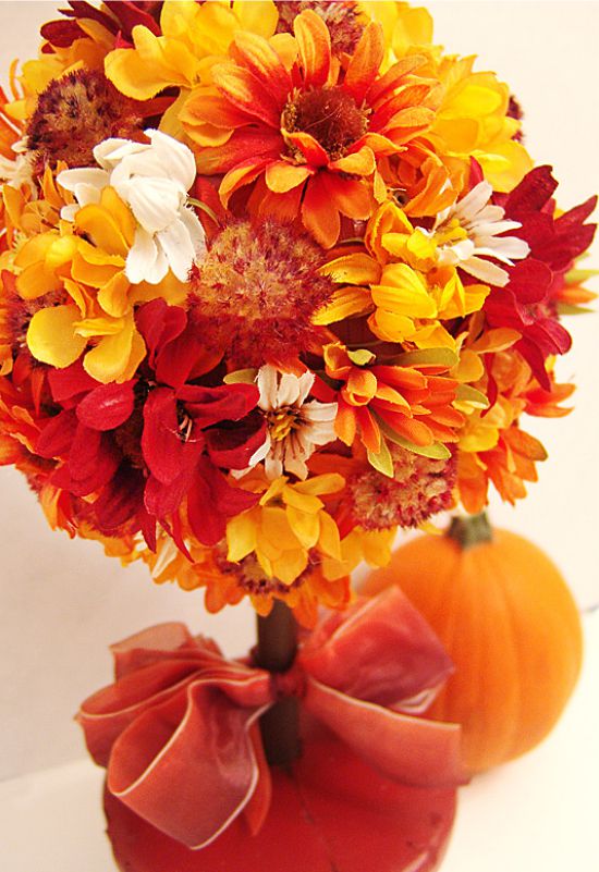 Autumn topiary made of artificial flowers