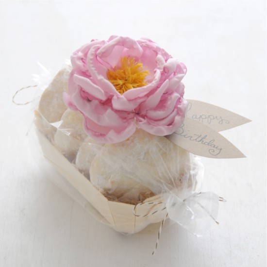 Peonies made of cloth on the package baking-gift