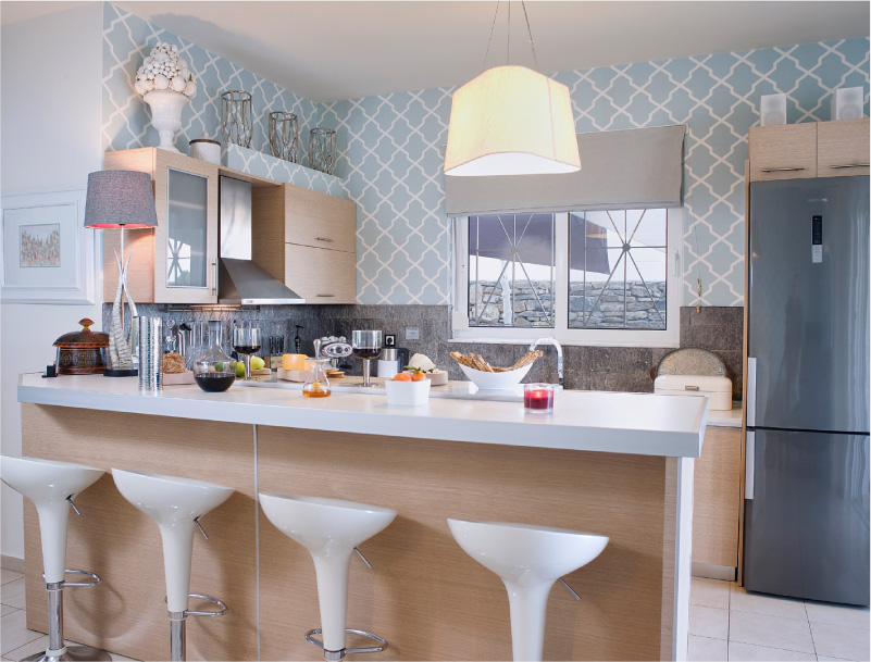 Beige kitchen with blue wallpaper