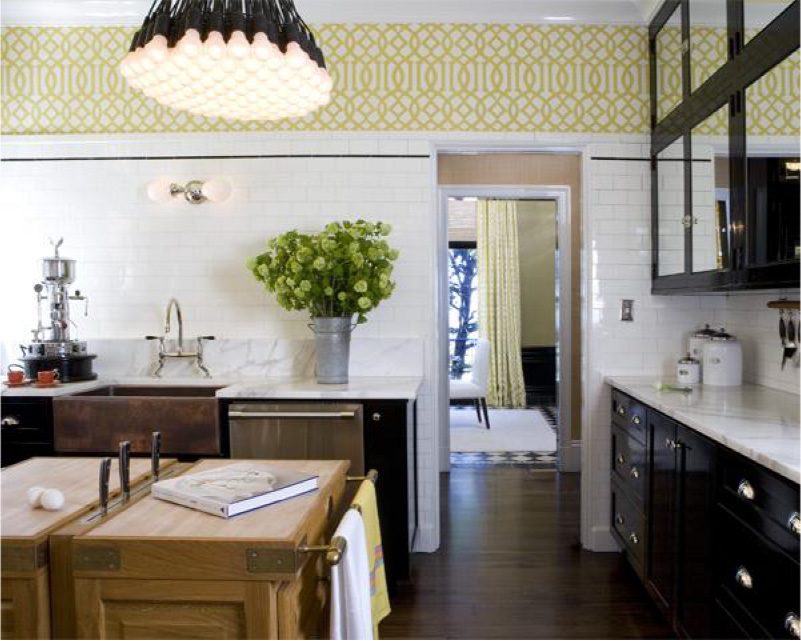 Black kitchen with white and yellow wallpaper