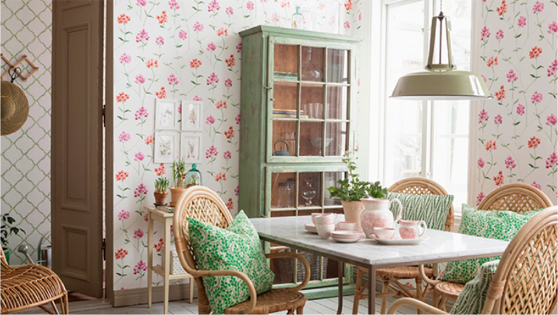 Pink wallpaper and green buffet
