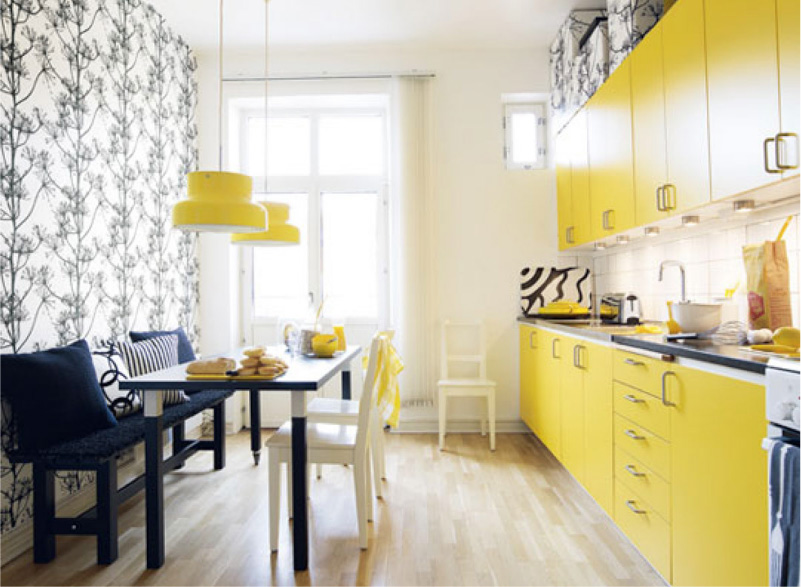Yellow kitchen with black and white wallpaper